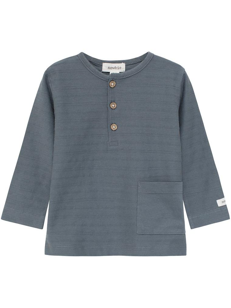Baby top with pocket